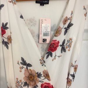 Showpo Ocean Avenue asymmetrical wrap dress.